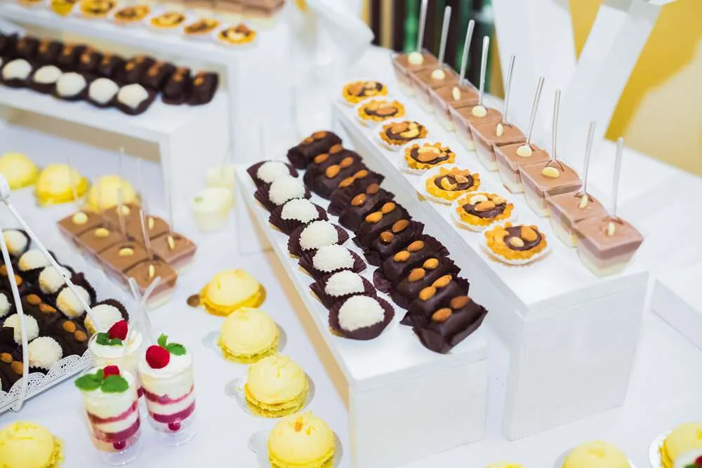 Delicious wedding reception candy bar dessert table.