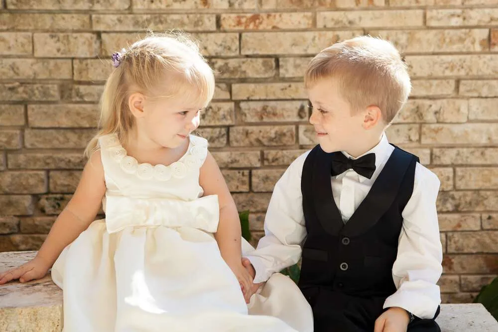 boy and girl dressed up for a wedding