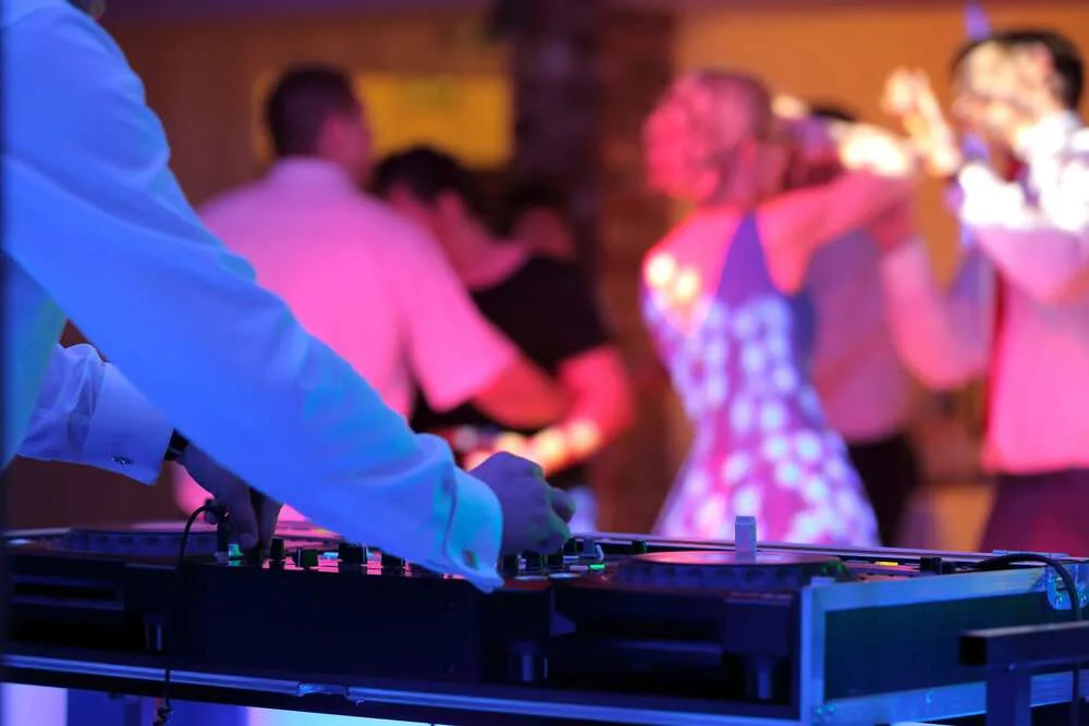 Dancing couples during wedding celebration