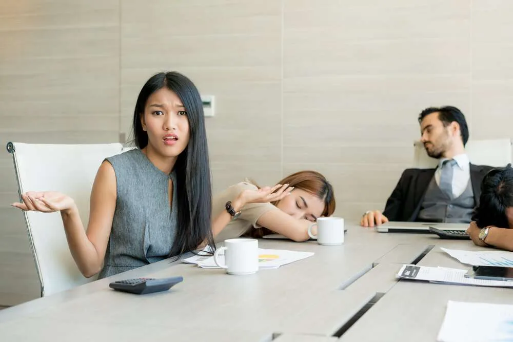 Bored business people and sleeping resting on workplace during work meeting, concept of exhausted businesspeople bored sleep tired.