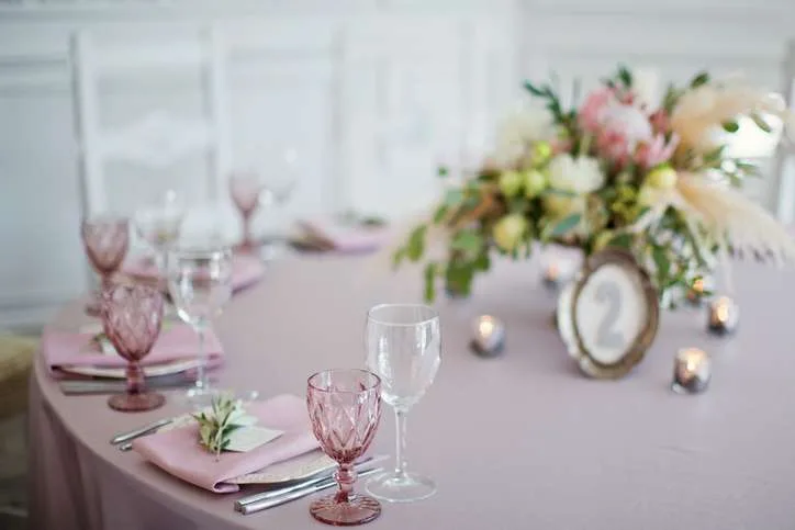 table appointments with flower compositions in bohemian style